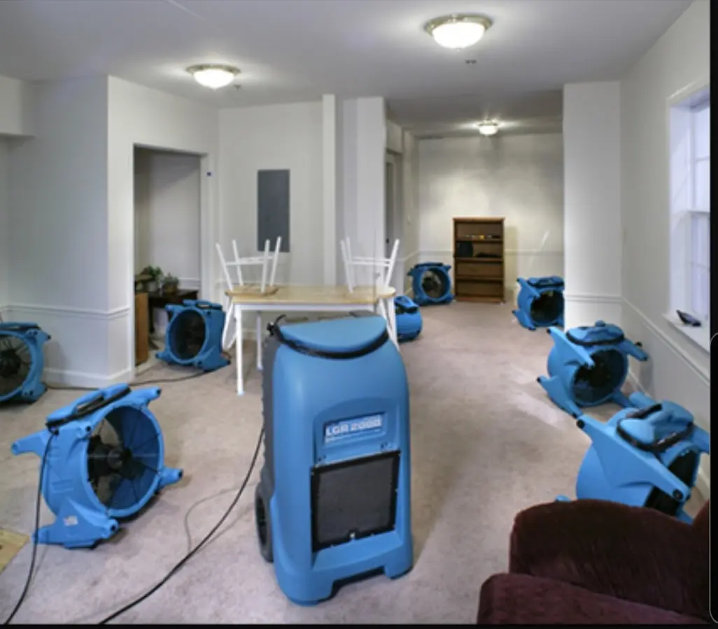 Air movers and dehumidifier setup for Water Extraction & Removal in Charlestown